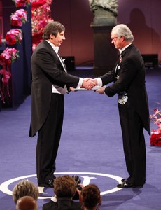 Andre Geim (left) receives the Nobel Prize in Physics