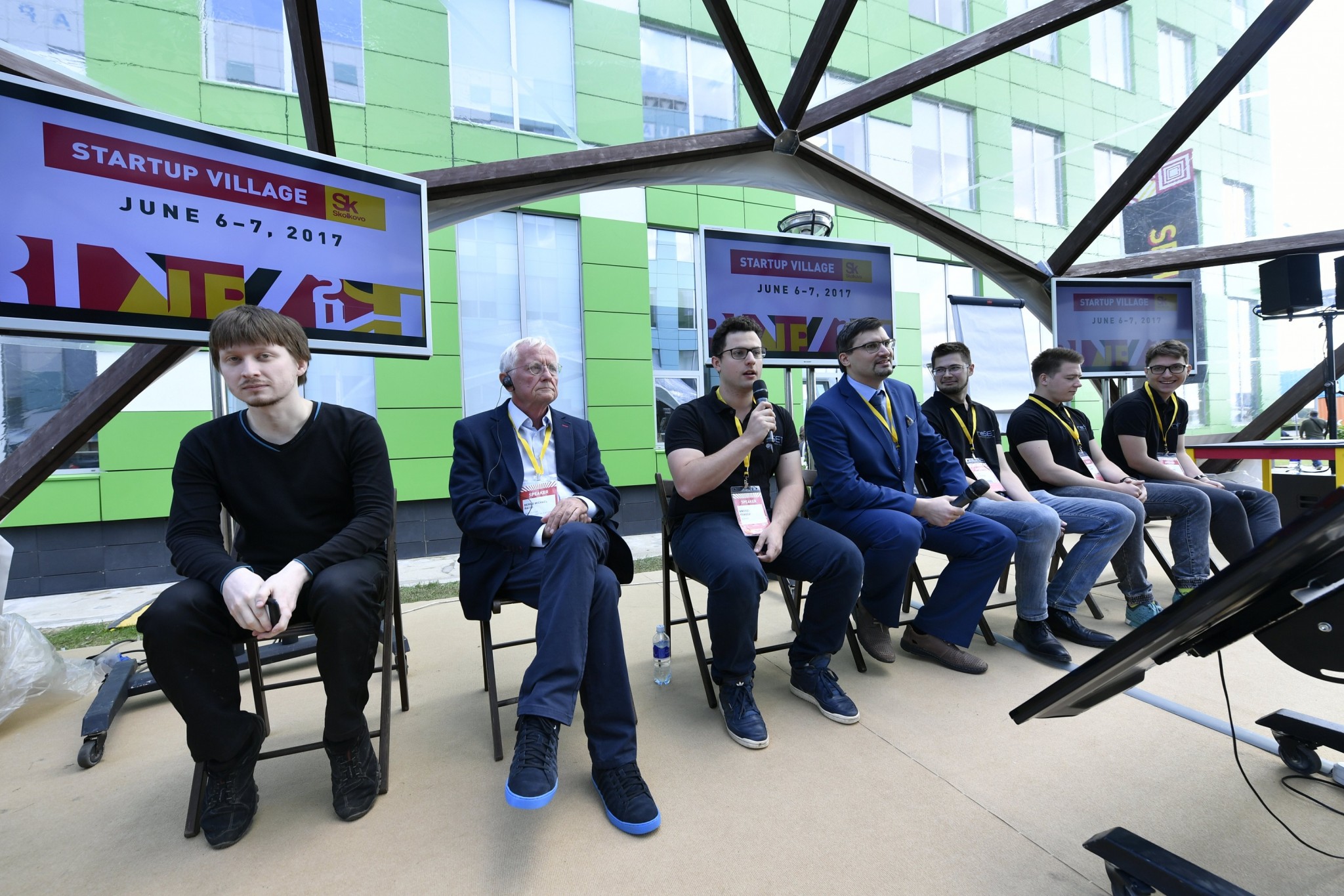 Members of Skoltech's award-winning robotics team reSET and renowned Artificial Intelligence expert Professor Bernd Radig of the Technical University of Munich (second from left) participate in a robotics panel at the Startup Village.