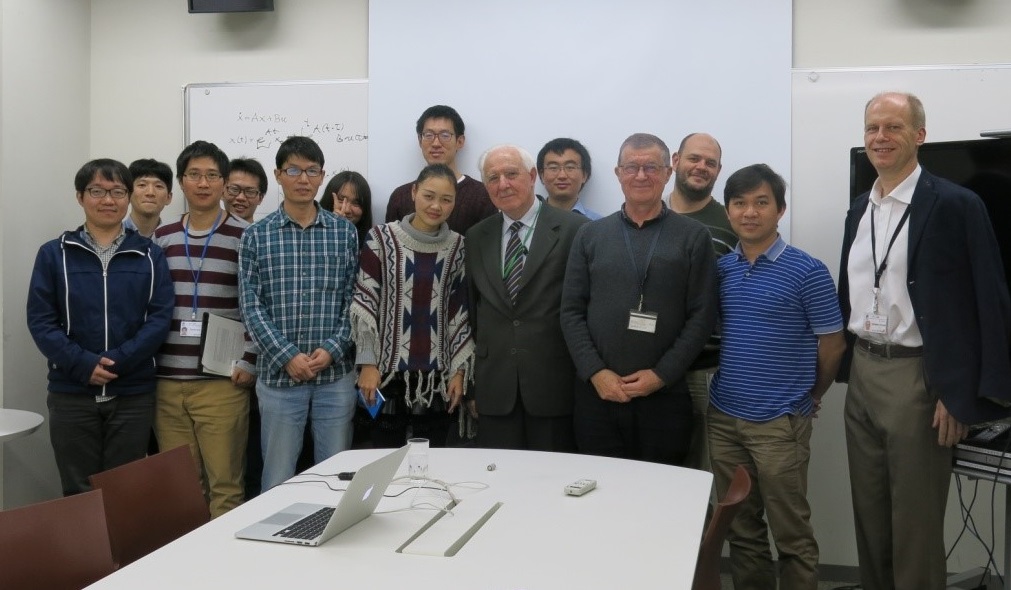 Cichocki (third from the right) and one of his research teams at RIKEN, pictured in 2016