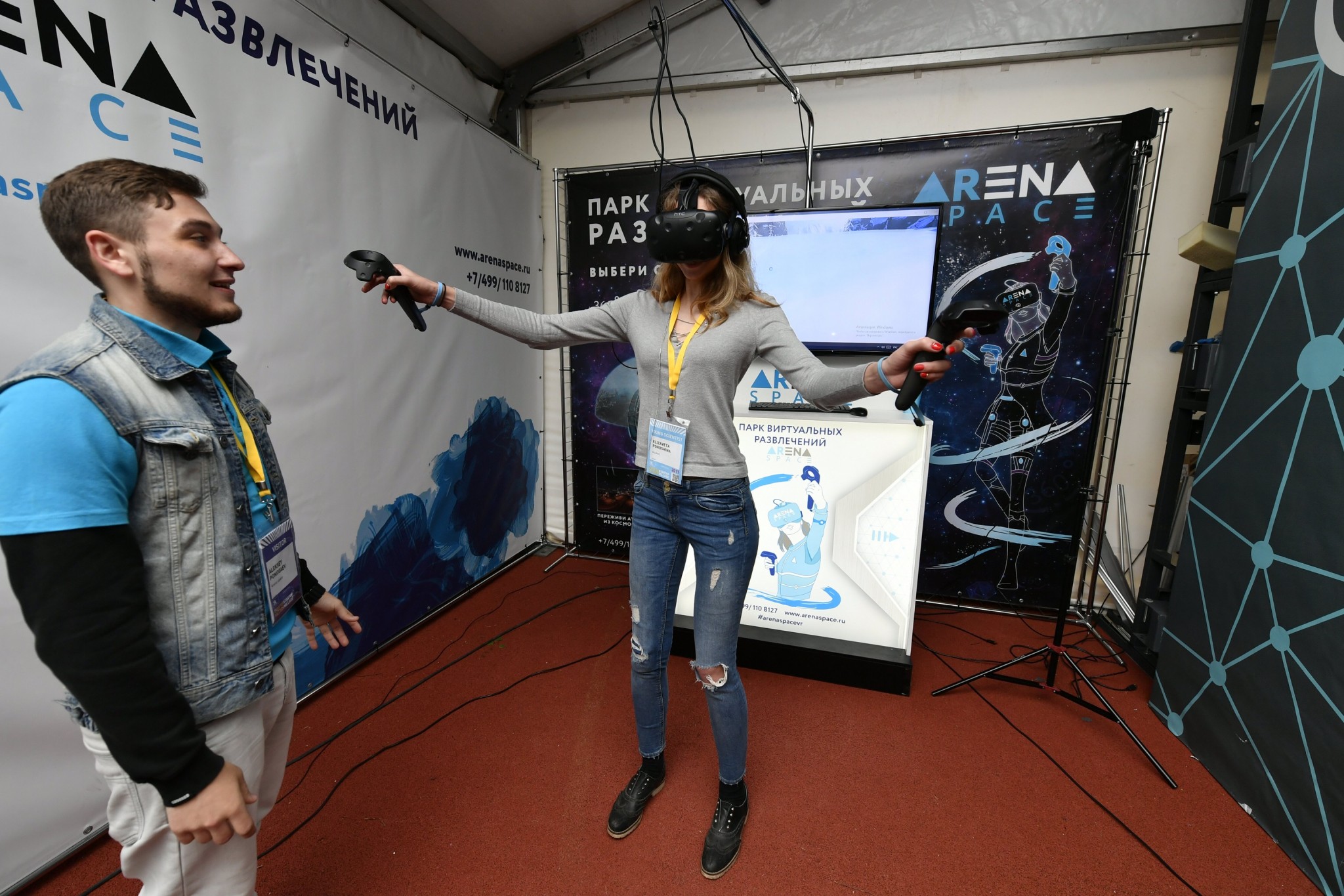 A young scientist tests out a virtual reality mask at the Startup Village.