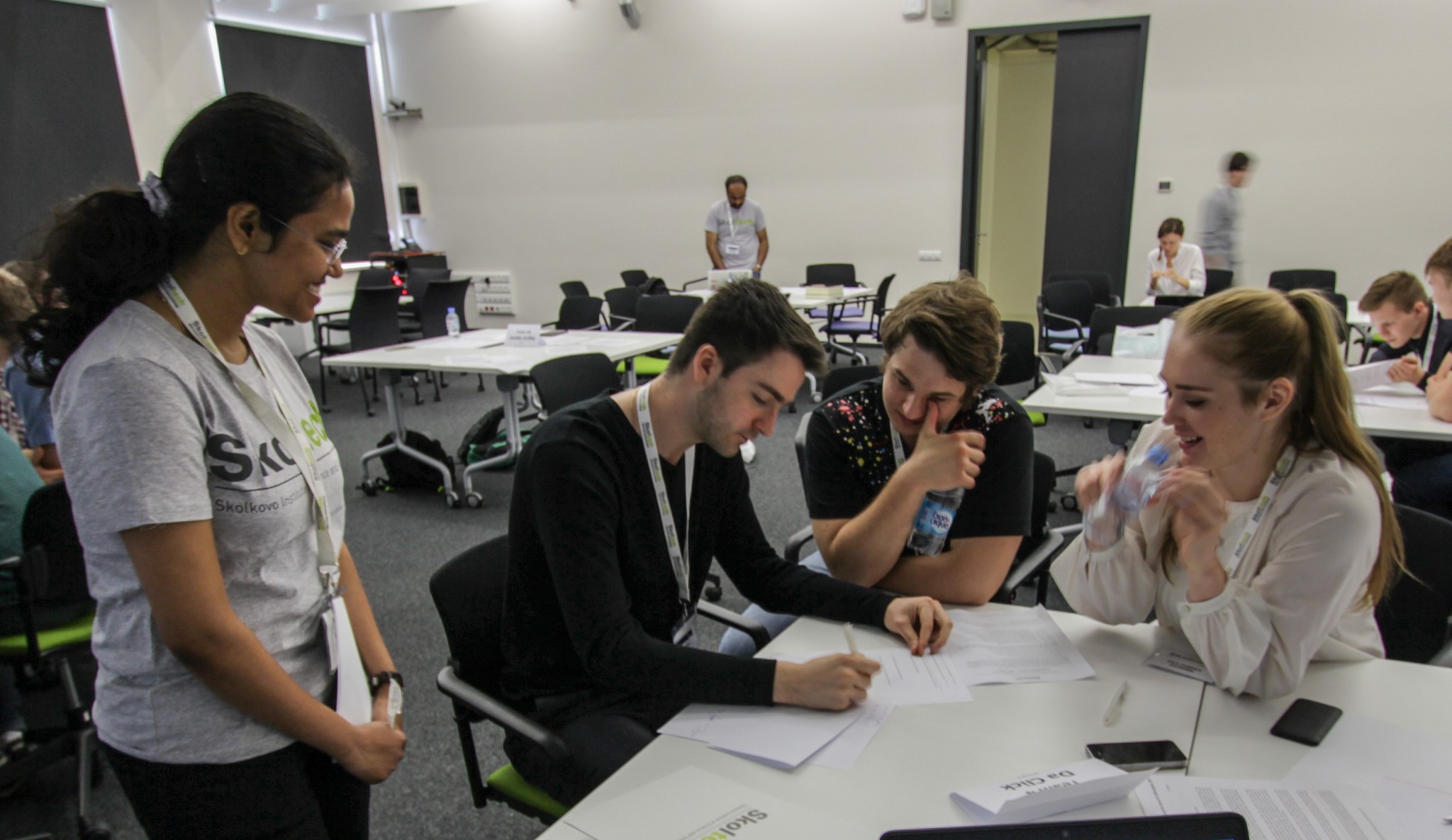 MSc student and Selection Days volunteer Shreya Santra watches as MSc hopefuls prepare for negotiations during the challenge. Photo: Skoltech.