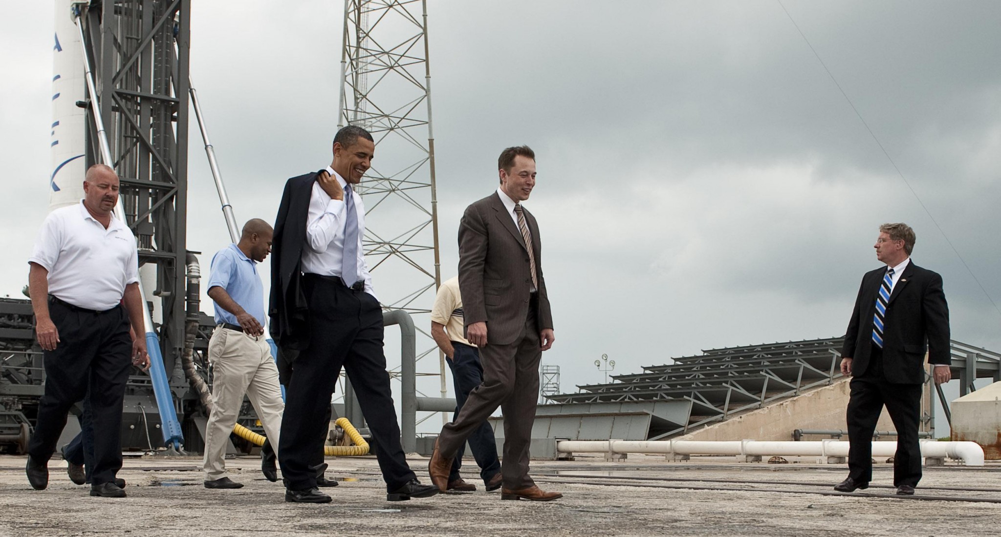 SpaceX founder Elon Musk (second to right) pictured with former US president Barack Obama at a SpaceX launch site in 2010. Photo: NASA // Wikipedia.