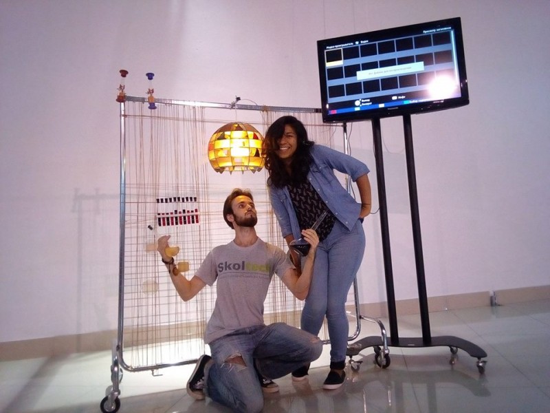 Skoltech MSc students Anton Krotov and Laura Elidedt Rodriguez pose with a lamp that was built as part of their bioart project at the Sirius Center for Gifted Education. Photo: Anton Krotov // Skoltech.