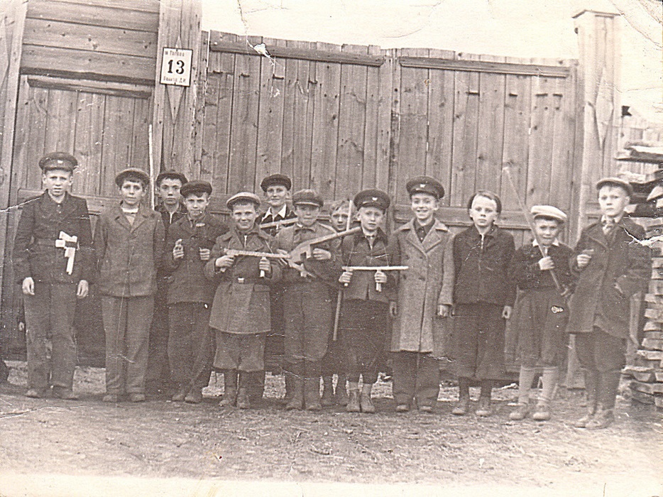 Peaceful from the very start: Nikolaev, second from the left, pictured as a young boy with his neighborhood friends in the early 1950s. Unlike most of the others, he wasn't sporting a home-made toy gun. Photo: Evgeny Nikolaev.