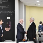 Skolkovo Foundation President Victor Vekselberg (center-left) greets Skoltech President Alexander Kuleshov ahead of the foundation council meeting on Friday. Photo: Sk.ru.