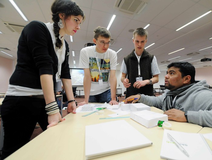 Mohammad Amirul Islam(right) discussing a challenge with fellow prospective students at the Selection Weekend