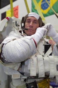Sergei Krikalev, cosmonaut and guest speaker at Skoltech, wears a training space suit at a NASA training in June 2004