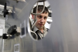 Professor Albert Nasibulin examines a carbon nanotube reactor at the lab he had helped set up at Helsinki University of Technology (nowadays Aalto University) in the early 2000s. Recently, he has moved to Moscow where he leads nanomaterial research and teaches at Skoltech.