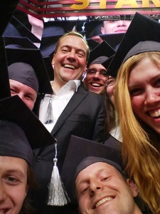 Russian Prime Minister Dmitry Medvedev poses for a 'selfie' photo with graduating Skoltech students at a ceremony held at the Startup Village conference. The innovation based university graduates 53 master's students in IT. Energy, Space and Advanced Manufacturing.