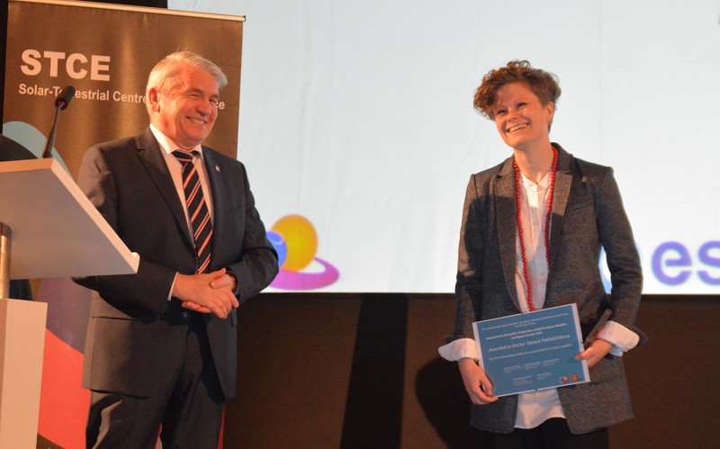 Alexander Razumov, the director of the Mission of Rossotrudnichestvo in Belgium awarding Tatiana Podladchikova with The International Alexander Chizhevsky medal for Space Weather and Space Climate. photo: Olivier Boulvin