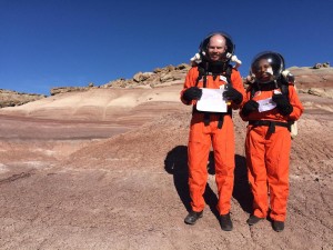 Divya Shankar (right) and Mikhail Khmelik present the Skoltech logo on "Mars"