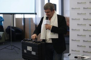 Skolkovo senior Vice President Alexander Chernov with a special gift.