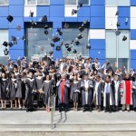 The traditional cap-throw at the end of the ceremony.